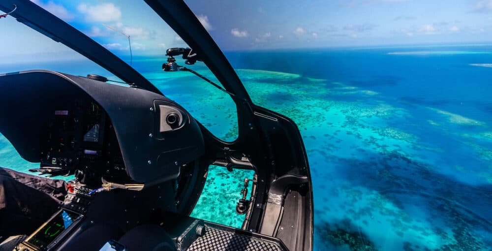 Helicopter ride over Moore Reef, part of the outer Great Barrier Reef in Australia