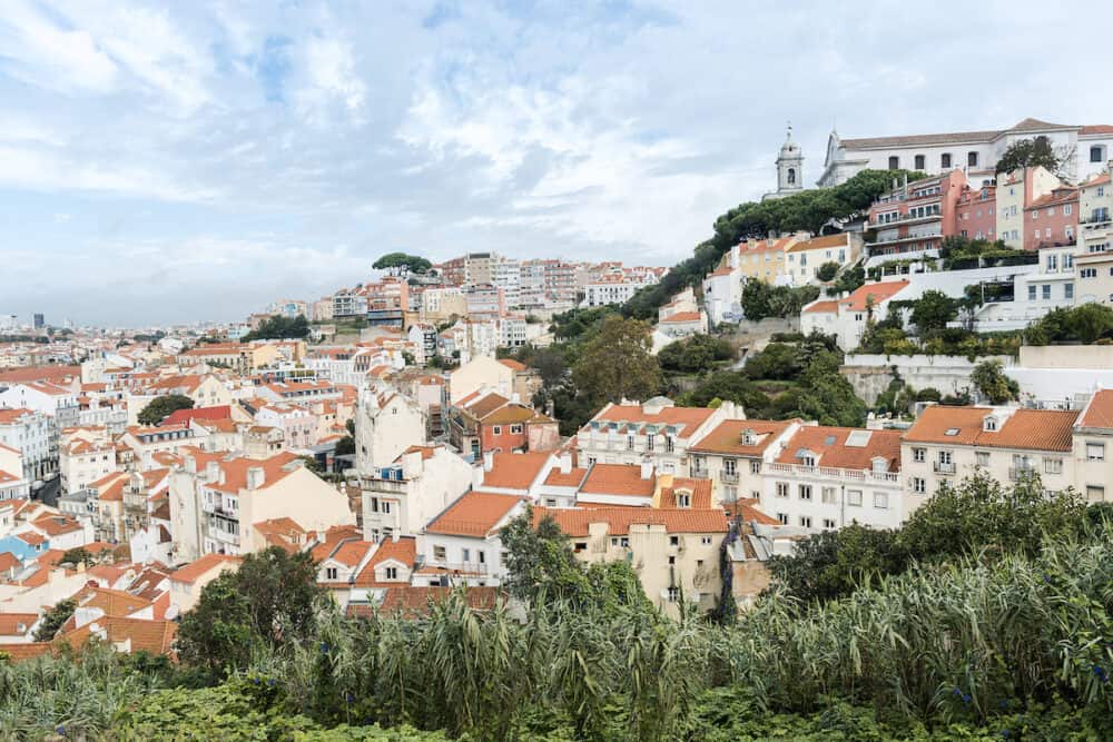 Aerial panoramic view of Lisbon, Portugal. Drone photo of the Lisbon old town skyline. Historical district in capital city of Portugal