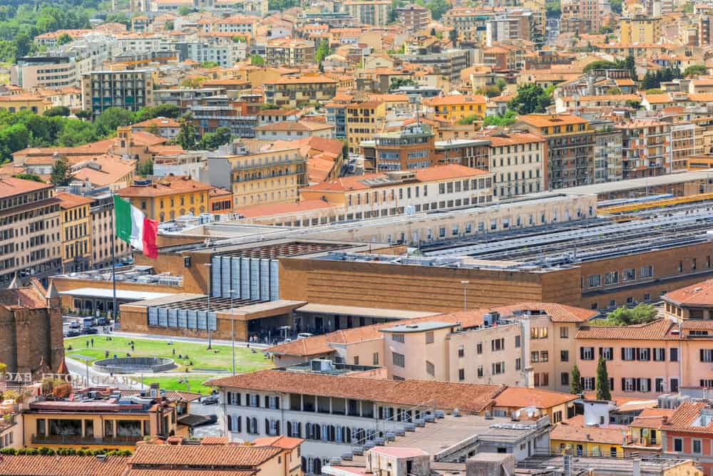 Beautiful landscape above urban and historical view of the Florence from Giotto's Belltower.Main Florence railways station- Firenze Santa Maria Novella.
