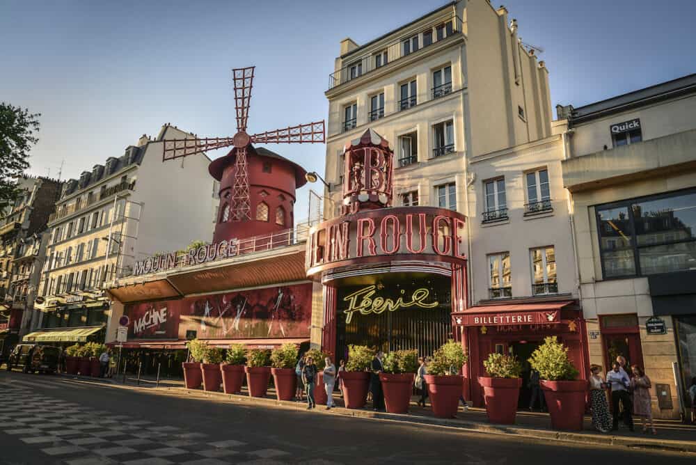 Paris, France - Moulin Rouge. Moulin Rouge is a famous Parisian cabaret built in 1889, locating in Paris red-light district of Pigalle on Boulevard de Clichy.