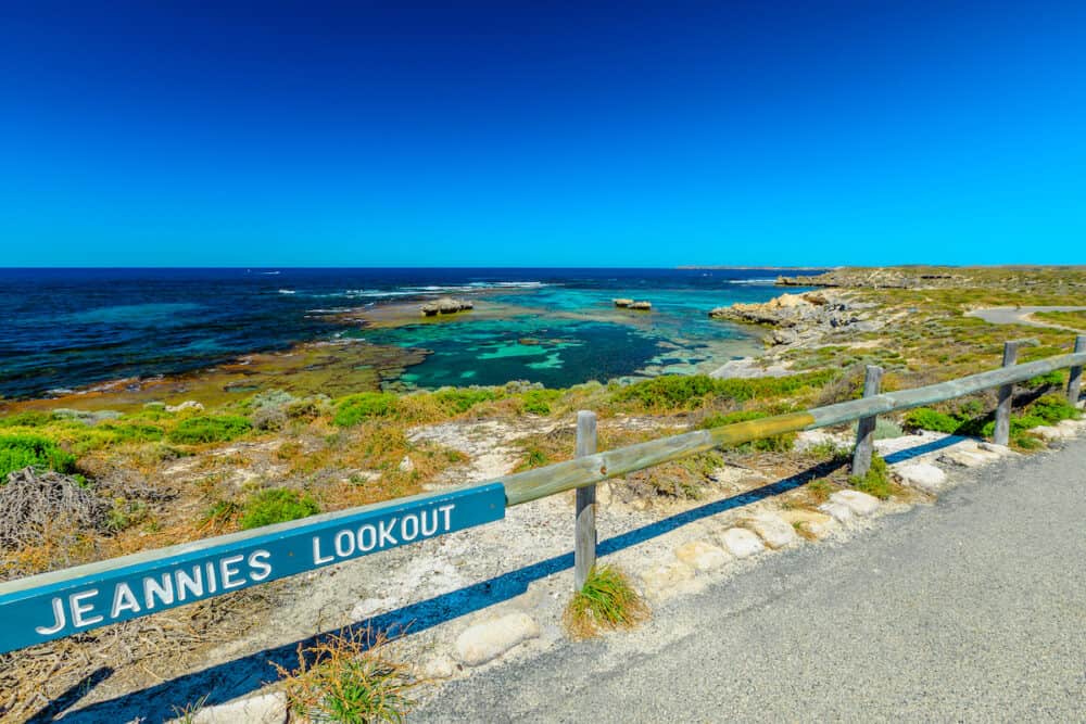 Jeannies Lookout sign at Rottnest Island in Western Australia. Panoramic views over turquoise tropical sea and rugged rocky. Tourism near Perth.