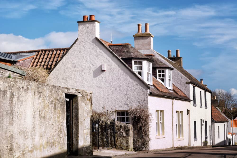 Old white houses in the historic village of Falkland in Scotland, home of Falkland Palace.