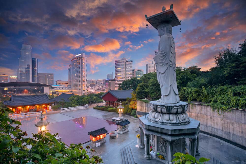 Seoul, South Korea. Cityscape image of Seoul, South Korea with the Seoul Bongeunsa Temple in the Gangnam District at sunset.