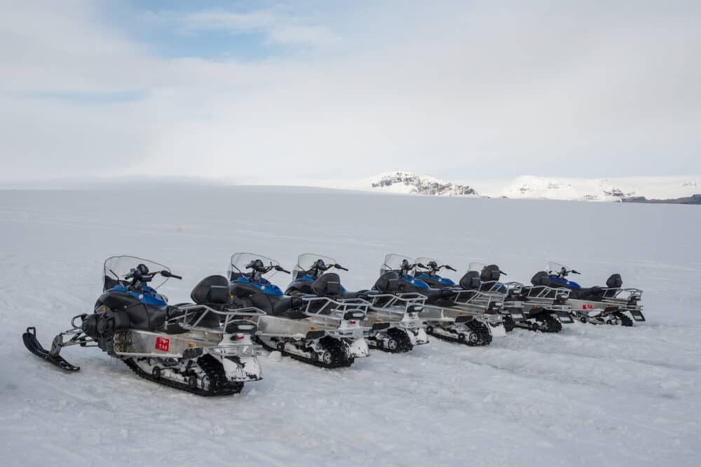 Vatnajokull Iceland - Yamaha snowmobiles from tour company Glacier Journey lined up on Skalafellsjokull glacier