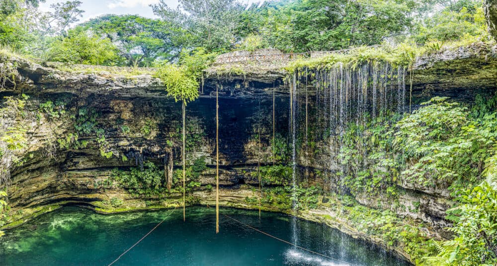 Great panoramic view of the subway cenote Saamal of chichén itzá is in the Mayan jungle hacienda of the Yucatan Peninsula in Mexico, it is an ideal place for vacation.