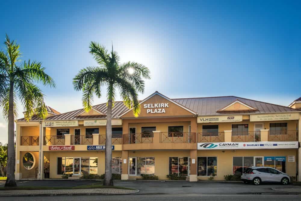 Grand Cayman, Cayman Islands - view of a building with shops at Selkirk Plaza in the George Town district