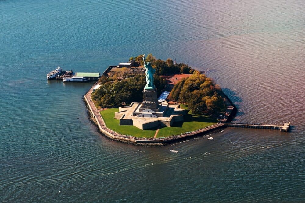 Stunning aerial view of the Statue of Liberty, New York from a helicopter.