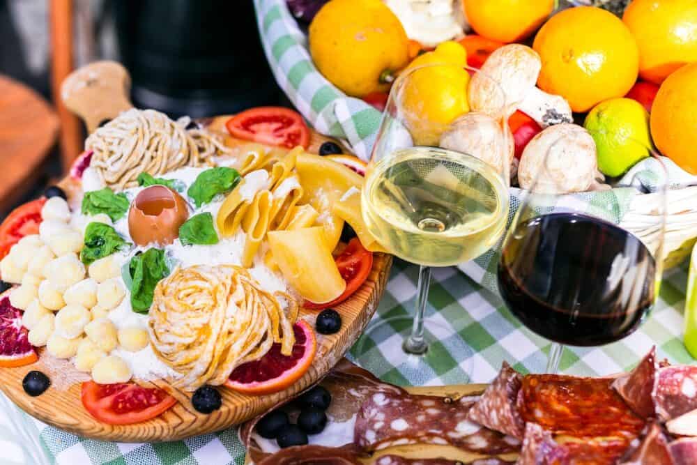 Travel Italy, Part of Italian culture - healthy mediterranean food. Rome street restaurants with variety of typical pasta, salumi and wine.