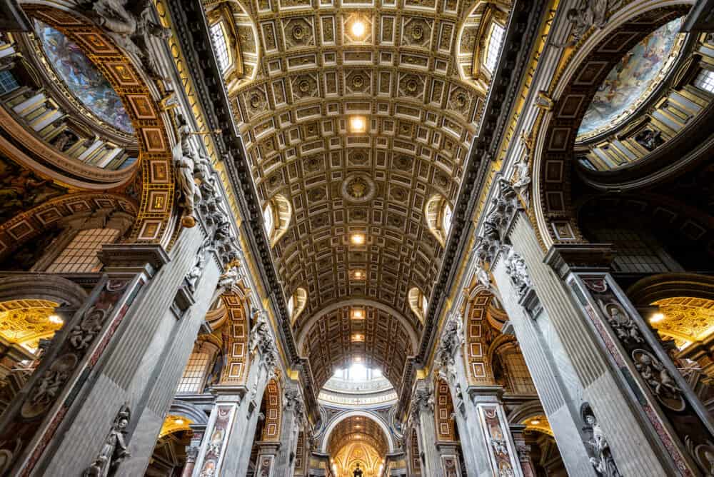 Rome - Inside St Peter Basilica, Rome, Italy. Saint Peters cathedral is top landmark of Rome and Vatican City. Ornate Baroque interior of St Peter church, famous luxury S Peter basilica