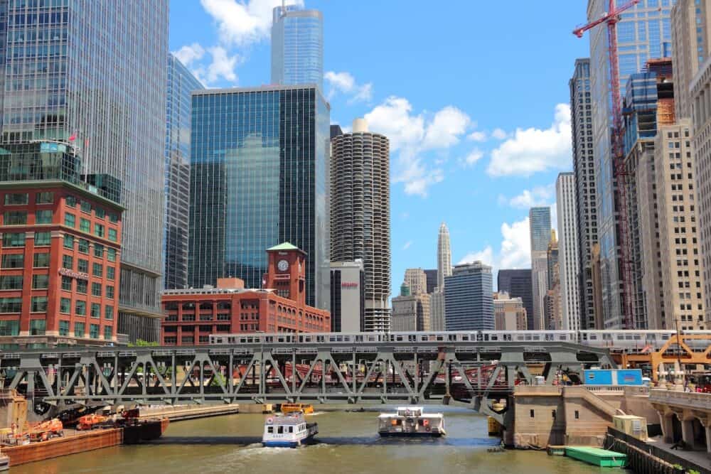 Downtown view with Chicago River. Chicago is the 3rd most populous US city with 2.7 million residents (8.7 million in its urban area).