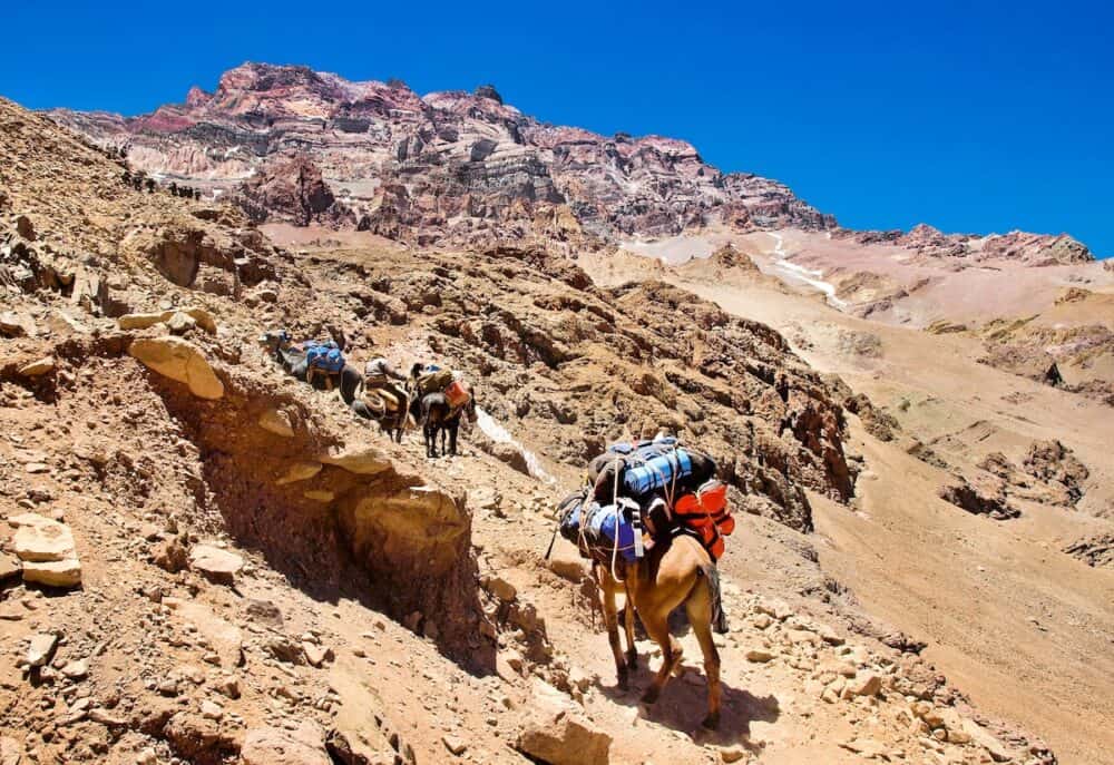 Beautiful view of a group of hikers trekking in the Andes Argentina South America