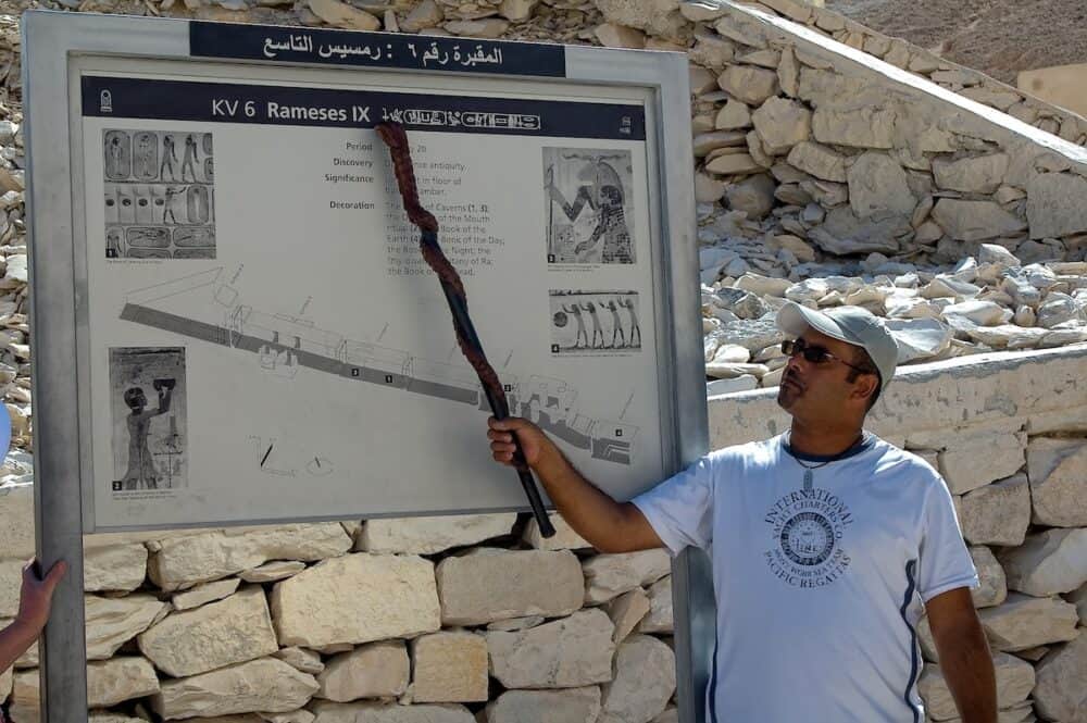 The guide tells about the Pharaoh Ramesses in Valley of the Kings