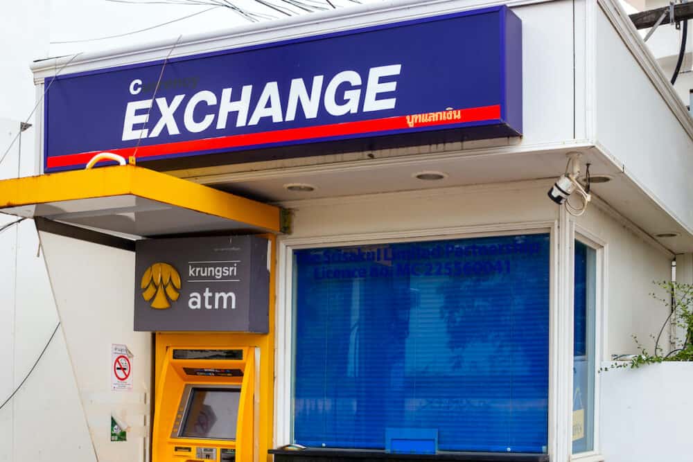 Money exchange office and ATM. Problems with withdrawing money and their high exchange rate. Travel and tourism. Thailand. 