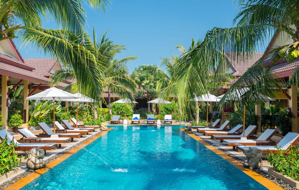 beautiful swimming pool in tropical resort , Phuket, Thailand.