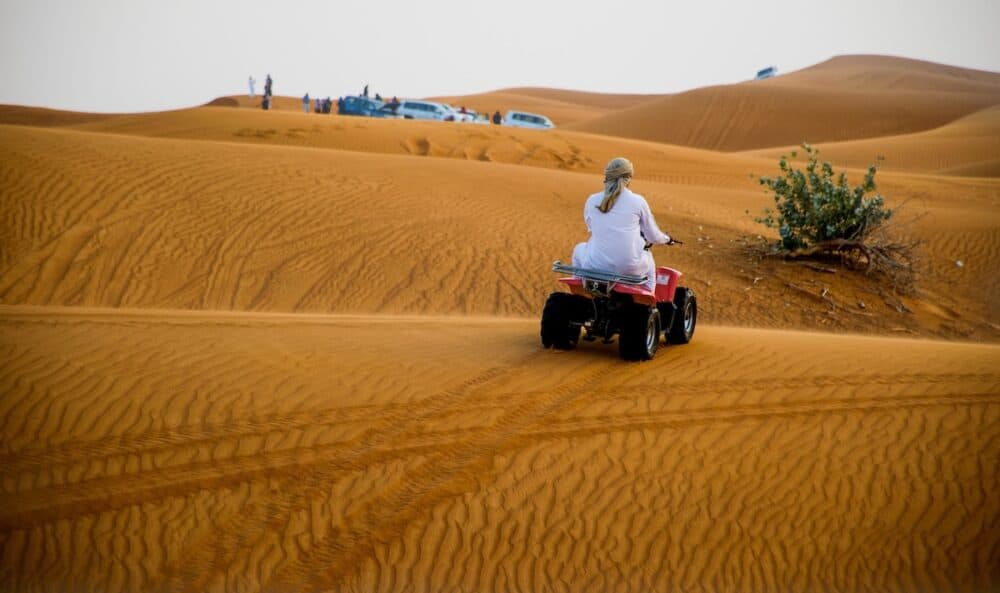 ABU DHABI UAE - Desert safari in Dubai United Arab Emirates. Dune bashing by a 4x4 car is a very popular activity.
