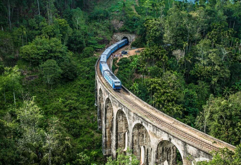 Train on the Nine Arches Demodara Bridge or the Bridge in the sky. Sri Lanka. Nine Arches Bridge is located in Demodara near Ella city Sri Lanka.