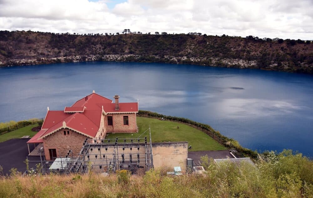 Blue Lake with the pumping station at Mt Gambier South Australia. The Blue Lake is a large monomictic crater lake located in a dormant volcanic maar associated with the Mount Gambier maar complex.