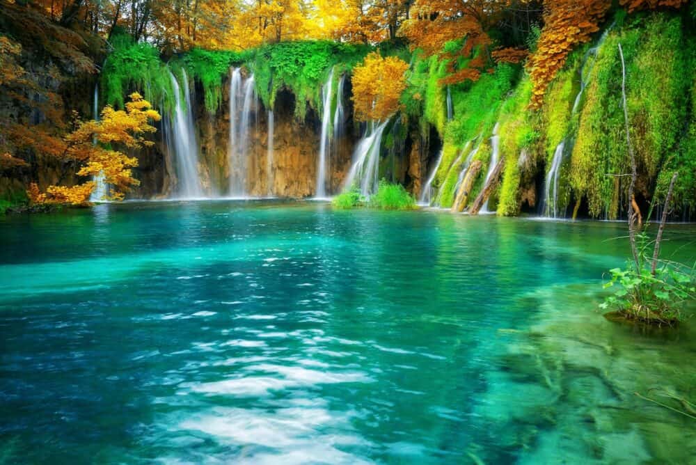 Exotic waterfall and lake landscape of Plitvice Lakes National Park, UNESCO natural world heritage and famous travel destination of Croatia. The lakes are located in central Croatia