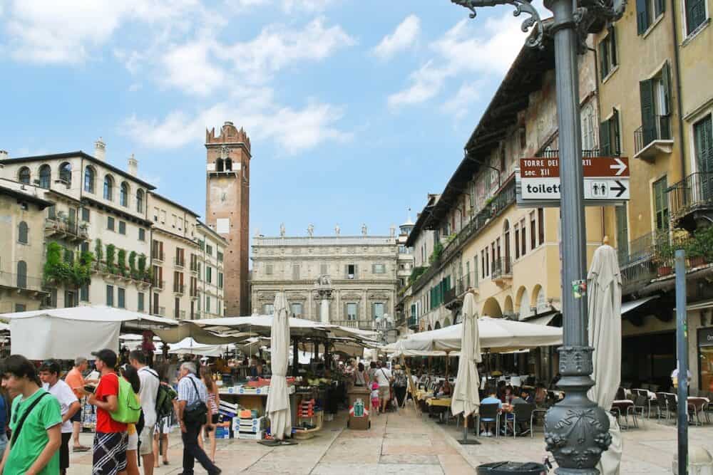 VERONA ITALY -street market on Piazza delle Erbe (Market's square) in Verona Italy. The square was the town's forum during the time of the Roman Empire.