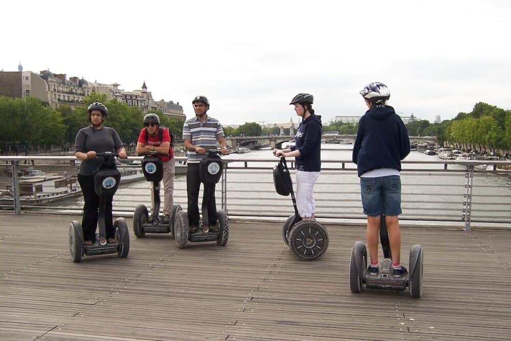 Paris, France - Tourists of different nationalities explore the sights of Paris on Segways