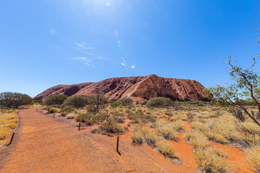 Outback, Australia - Close up views of red sandstone rock in the center of Australia. The Uluru or Ayers Rock in the Northern Territory in the outback. Ayers Rock a holy sanctuary