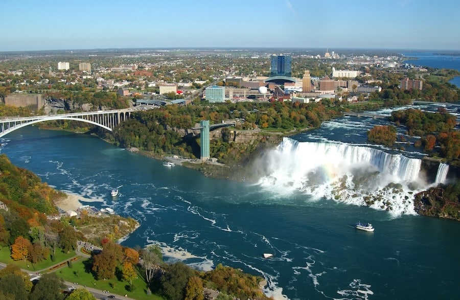 Niagara Falls and Rainbow Bridge view from tower in Canada.