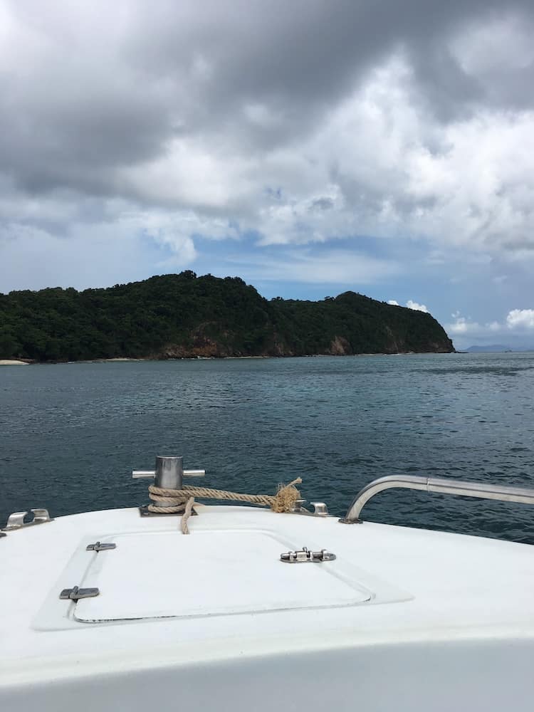 Sitting on a boat waiting to go Snorkelling near Phuket Thailand