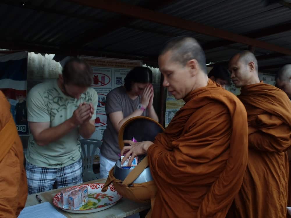 Showing respect to Monks in Thailand